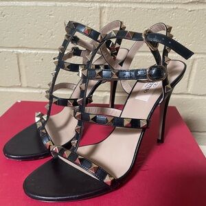 Valentino Garavani Black Heels with Gold Studs